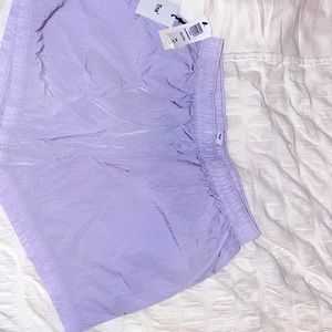 TNA windbreaker shorts (lavender)